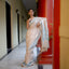 Beige pure Tassar Jamdaani Saree with White Vine and Aqua and Blue Motifs