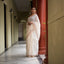 Ivory Pure Cotton Jamdaani Saree with Red Motifs and Beige Border