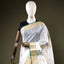Ivory Chanderi Silk Saree – Gold Zari & Green Border