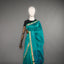 Rangrekha Peacock Teal Silk Cotton Jamdani Saree – Green-Edged Gold Zari Border