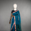Rangrekha Ocean Teal Silk Cotton Jamdani Saree – Crimson-Edged Gold Zari Border