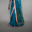 Rangrekha Ocean Teal Silk Cotton Jamdani Saree – Crimson-Edged Gold Zari Border