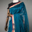 Rangrekha Ocean Teal Silk Cotton Jamdani Saree – Crimson-Edged Gold Zari Border