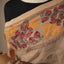 Kantha Vriksha Linen Saree – Natural Beige with Hand-Embroidered Marigold &amp; Terracotta Floral Jaal
