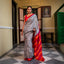 Black and white Bishnupuri silk saree with red, dark pink and orange striped Pallu and border