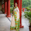 Ivory Bishnupur silk saree with hand painted yellow sunflower and green leaves