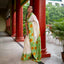 Ivory Bishnupur silk saree with hand painted yellow sunflower and green leaves